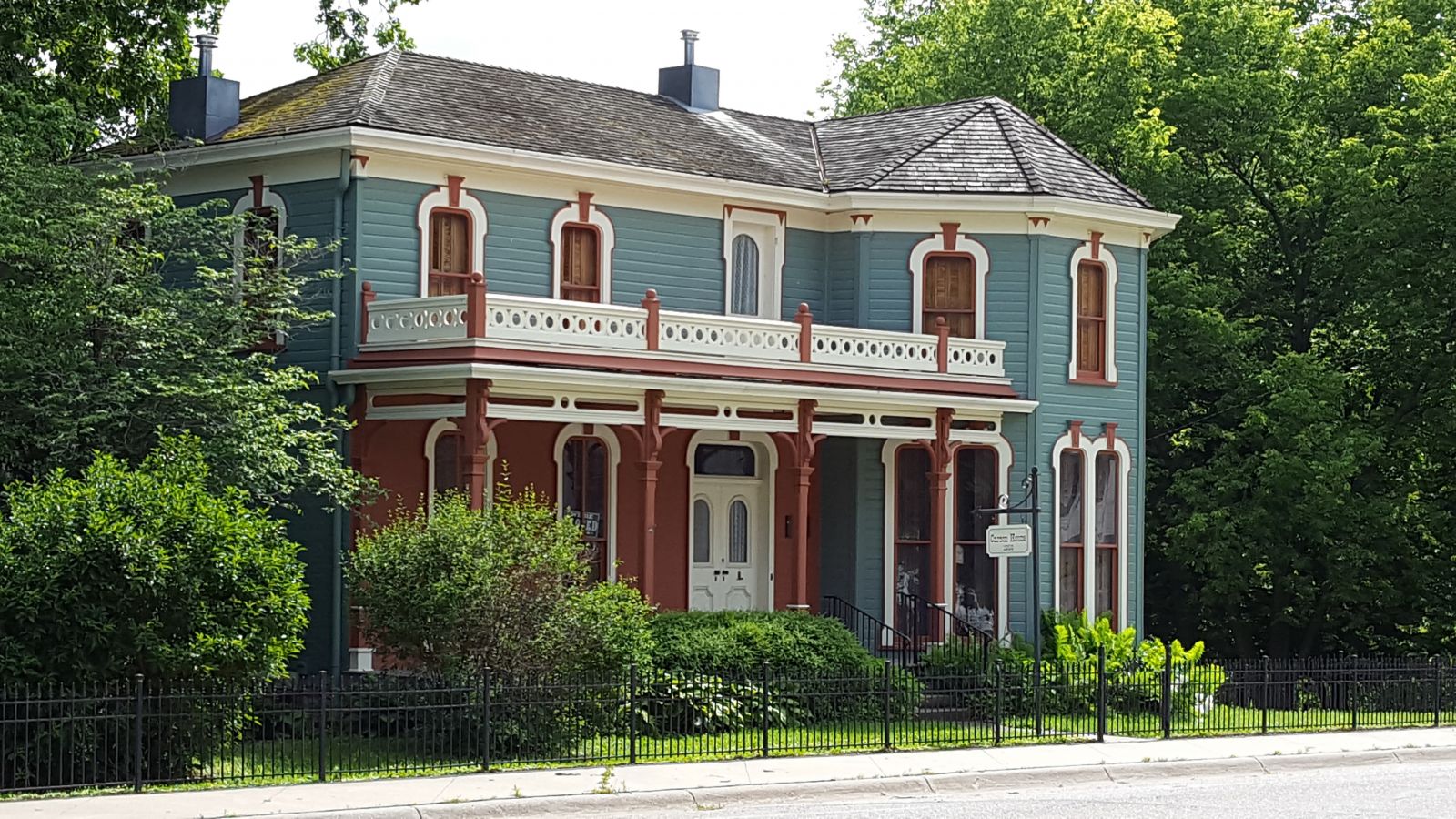 Victorian architectural design embraced many colors such as in this home with blue, brown, and white.